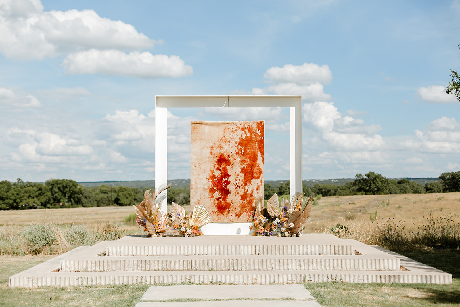 Open-air wedding ceremony setting at a domestic destination venue