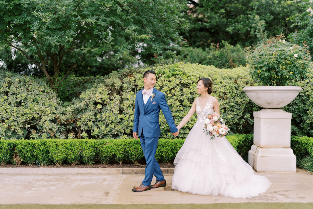 A joyful, unscripted moment between the couple, captured during portraits, showcasing the ease and trust that come with working with a professional planner.