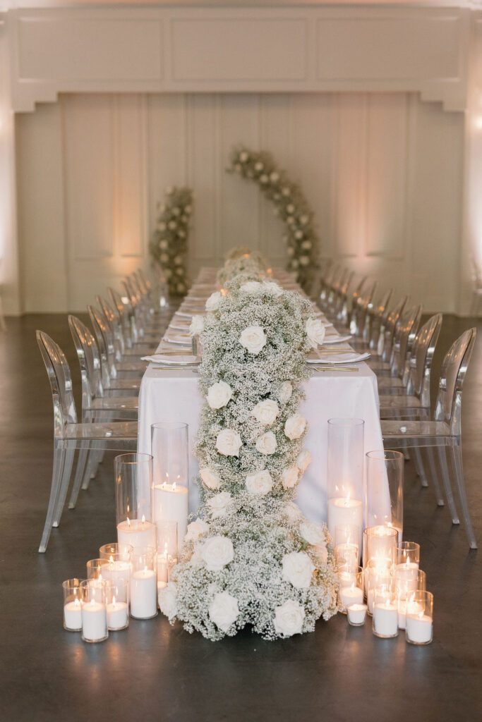 Reception hall with coordinated table arrangements and open guest flow.