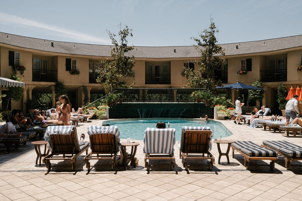 Pool courtyard at Hotel ZaZa Houston Museum District hosting wedding weekend guests.